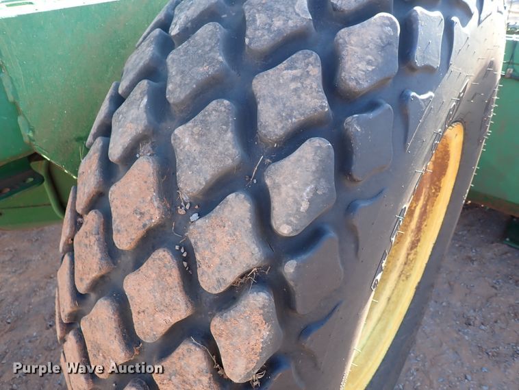 image for item DN0015 2006 John Deere 4895  windrower