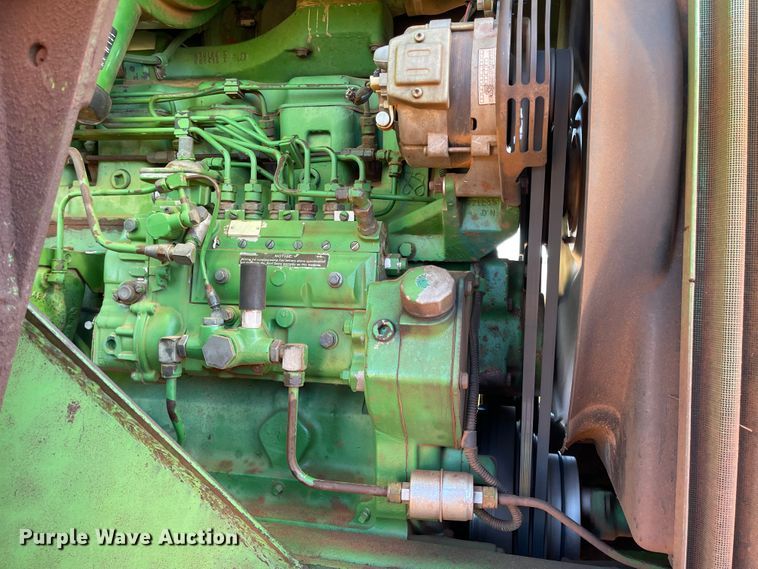 image for item IK9680 1983 John Deere 4450  MFWD tractor