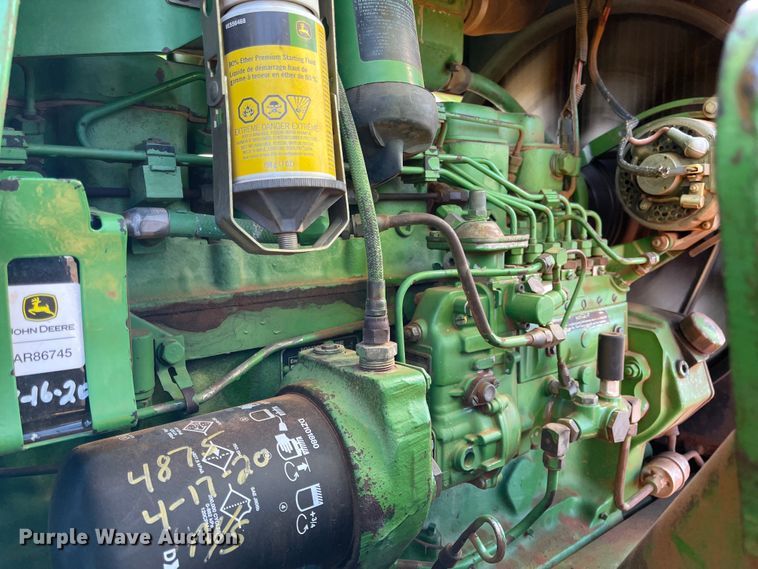 image for item IK9680 1983 John Deere 4450  MFWD tractor