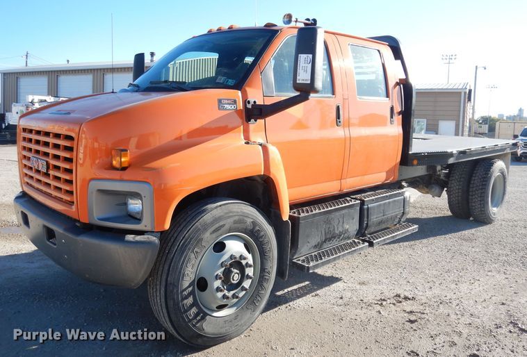 image for item DK3057 2005 GMC C7500  Crew Cab flatbed truck