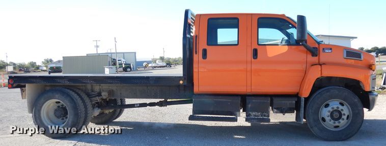image for item DK3057 2005 GMC C7500  Crew Cab flatbed truck