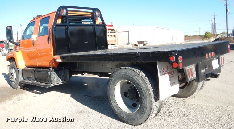 image for item DK3057 2005 GMC C7500  Crew Cab flatbed truck
