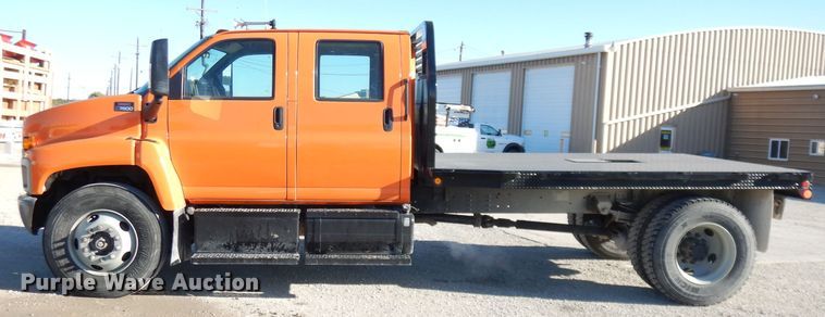 image for item DK3057 2005 GMC C7500  Crew Cab flatbed truck