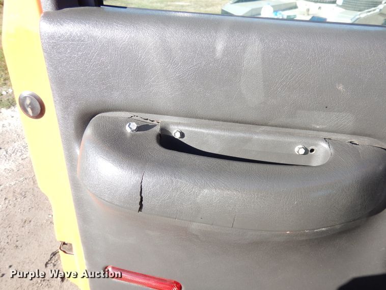 image for item DK3057 2005 GMC C7500  Crew Cab flatbed truck