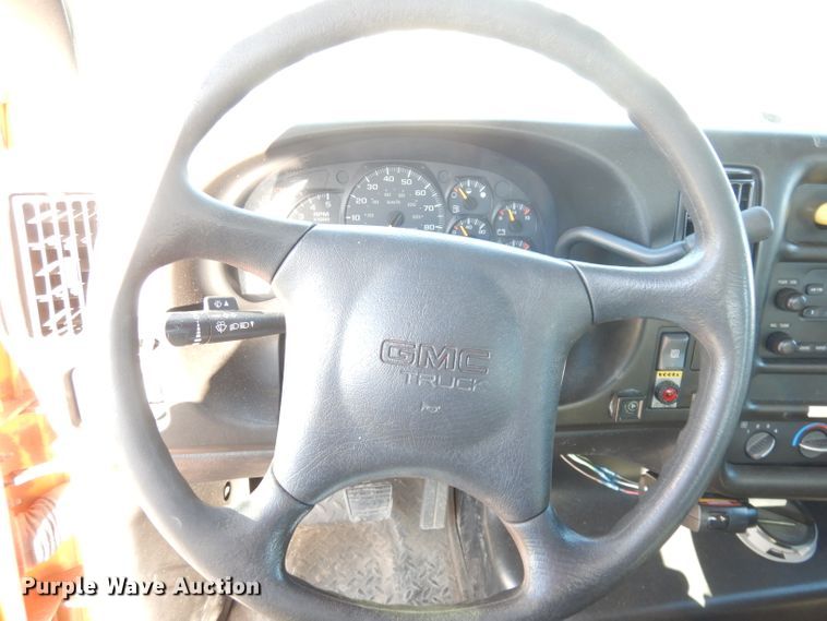 image for item DK3057 2005 GMC C7500  Crew Cab flatbed truck