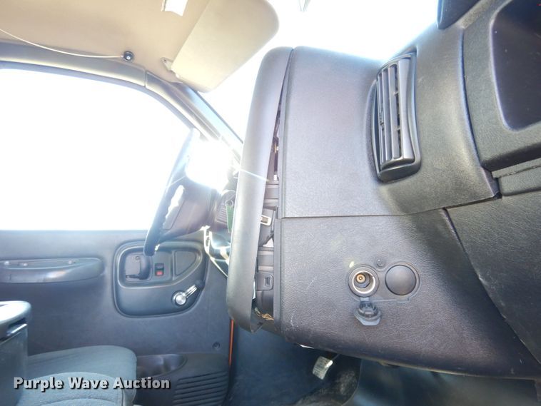 image for item DK3057 2005 GMC C7500  Crew Cab flatbed truck