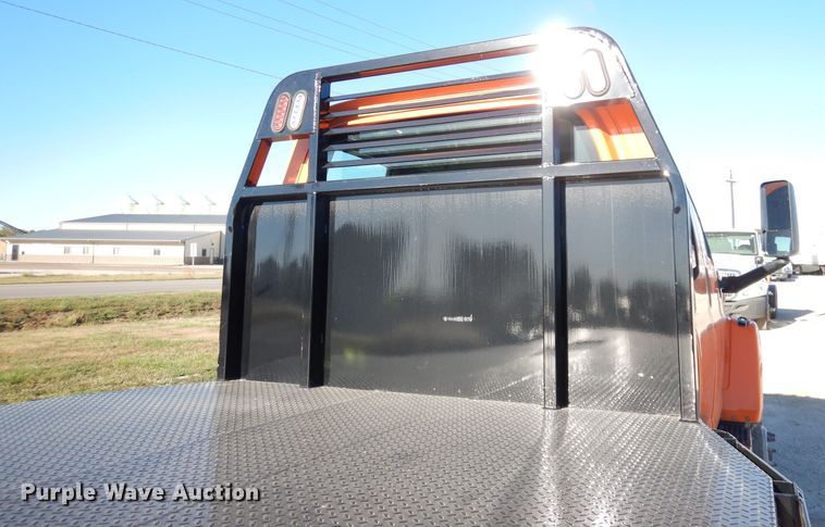 image for item DK3057 2005 GMC C7500  Crew Cab flatbed truck