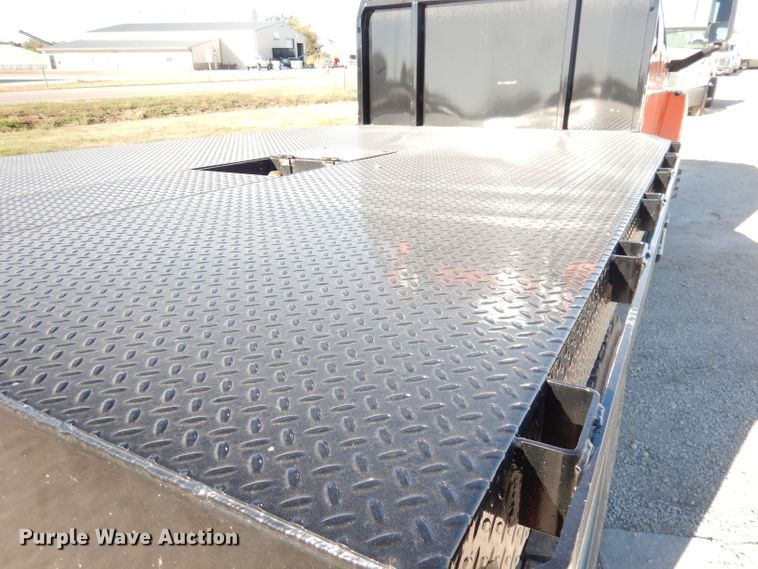 image for item DK3057 2005 GMC C7500  Crew Cab flatbed truck