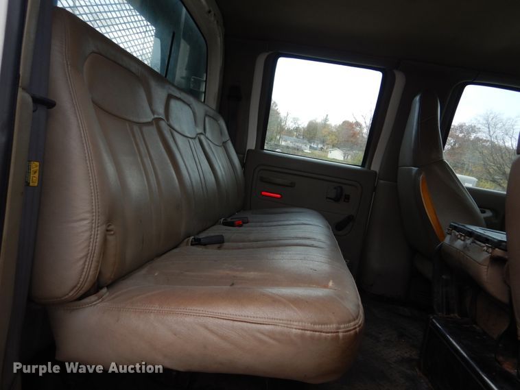 image for item IV9580 2004 GMC C6500  Crew Cab flatbed truck