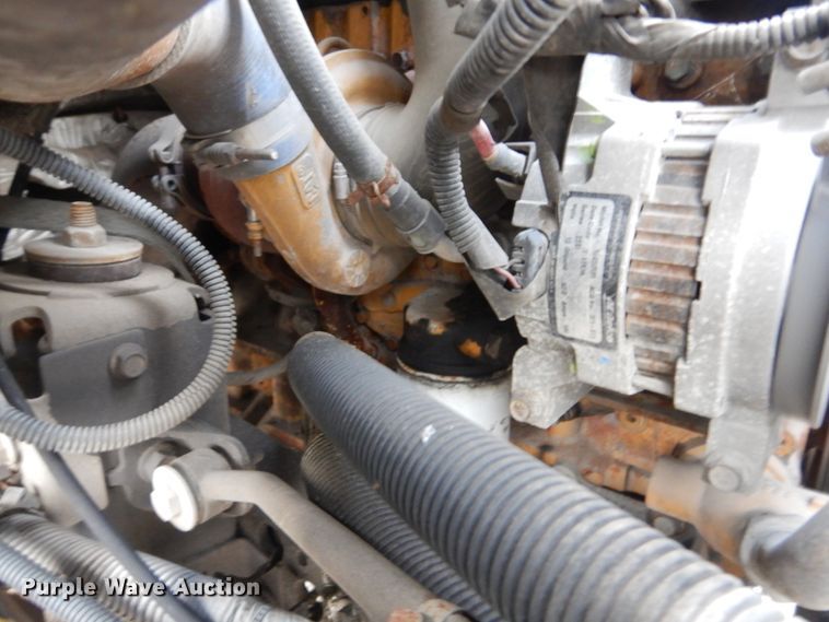 image for item IV9580 2004 GMC C6500  Crew Cab flatbed truck