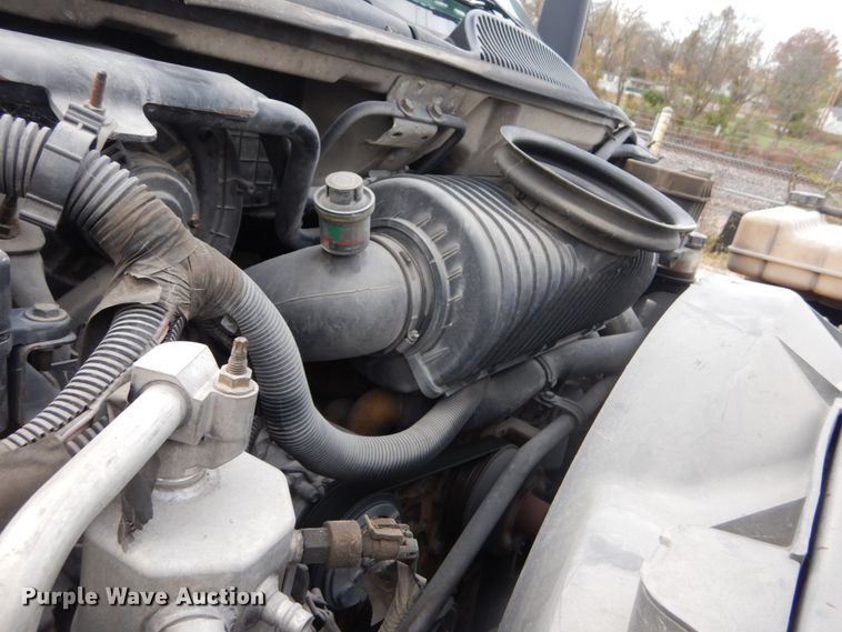 image for item IV9580 2004 GMC C6500  Crew Cab flatbed truck