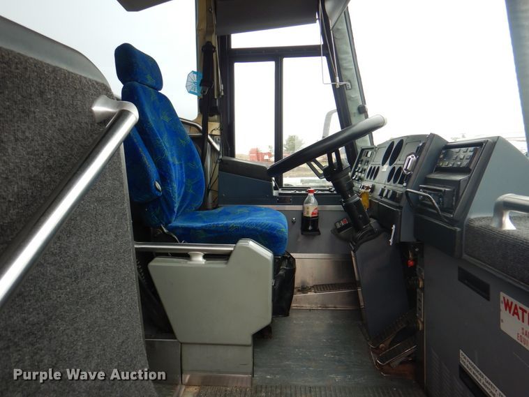 image for item JS9224 1999 Motor Coach Industries 102-DL3  coach bus