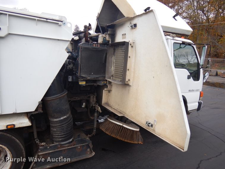 image for item KK9703 2004 Isuzu NQR  street sweeper truck