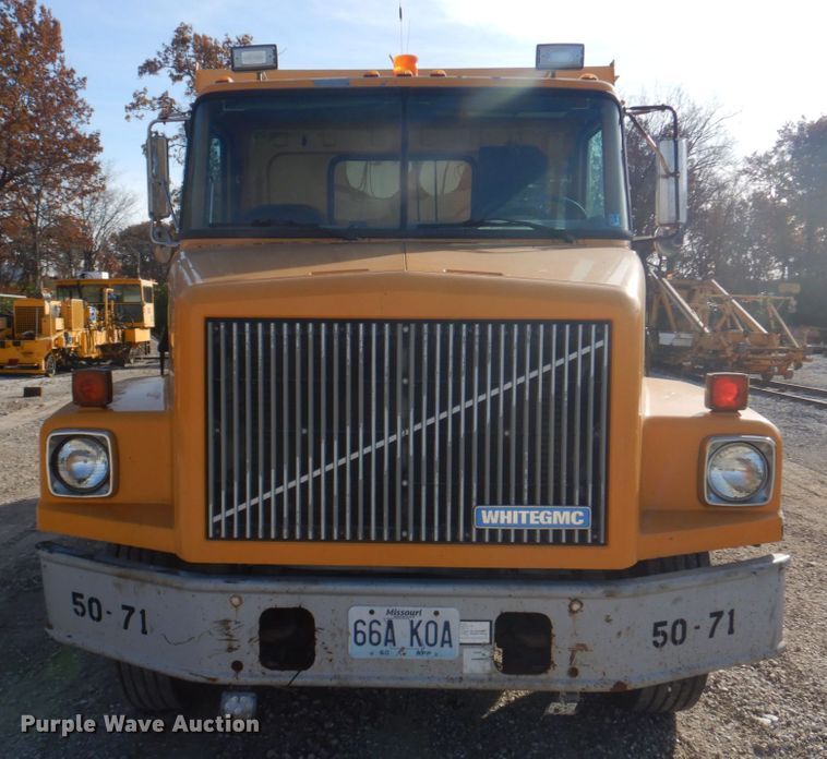 image for item DH8032 1994 White GMC WG  dump truck
