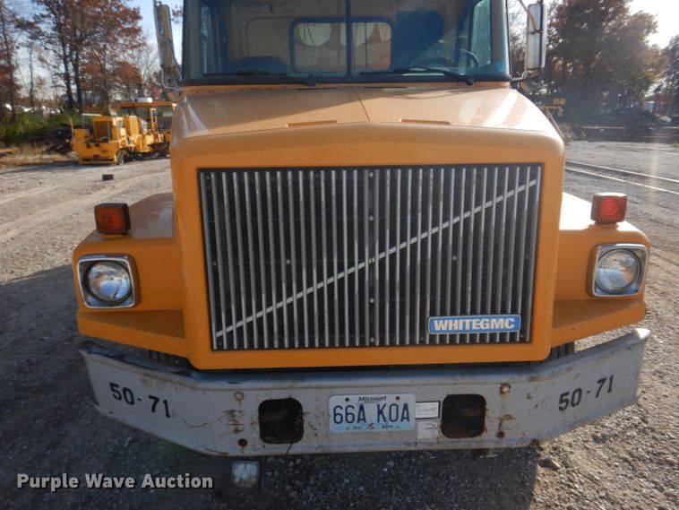 image for item DH8032 1994 White GMC WG  dump truck
