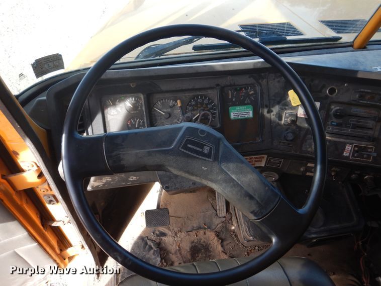 image for item DH8032 1994 White GMC WG  dump truck