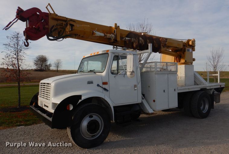 image for item DH8037 1999 International 4700  digger derrick truck