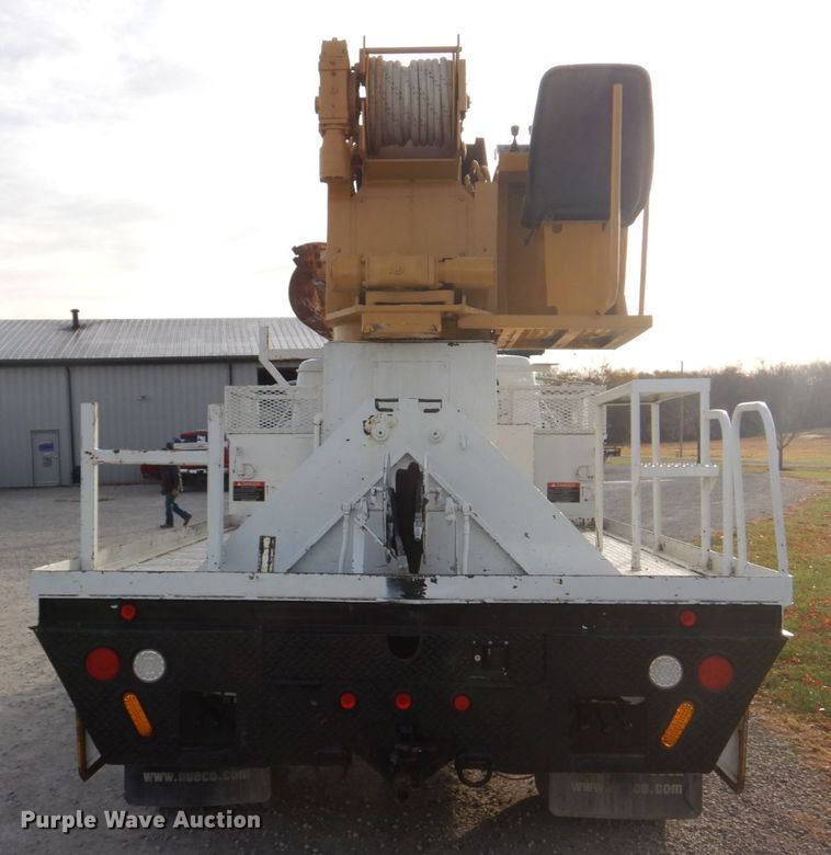 image for item DH8037 1999 International 4700  digger derrick truck