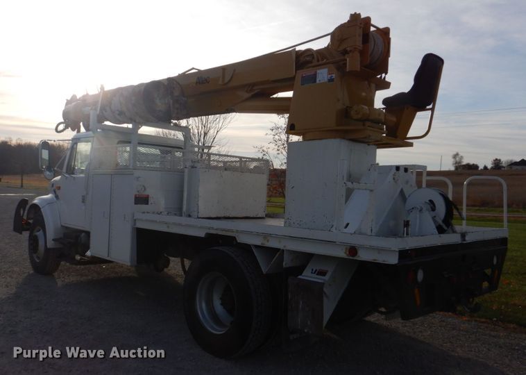 image for item DH8037 1999 International 4700  digger derrick truck