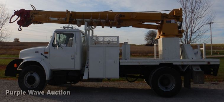 image for item DH8037 1999 International 4700  digger derrick truck