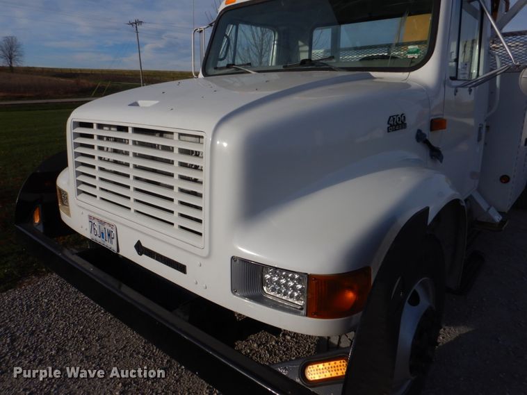 image for item DH8037 1999 International 4700  digger derrick truck