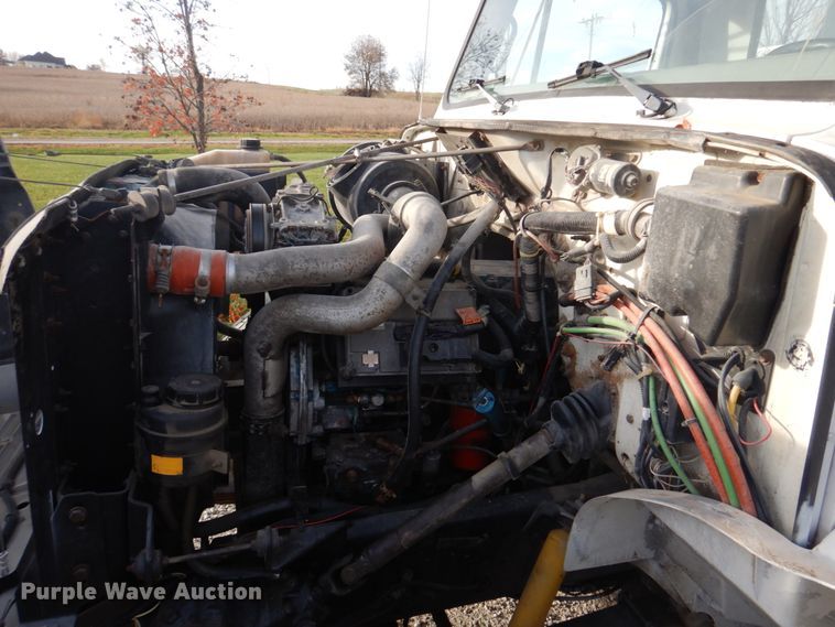 image for item DH8037 1999 International 4700  digger derrick truck