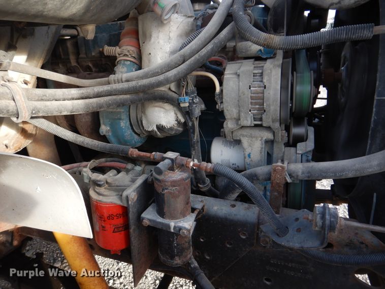 image for item DH8037 1999 International 4700  digger derrick truck