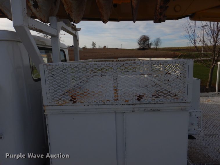 image for item DH8037 1999 International 4700  digger derrick truck