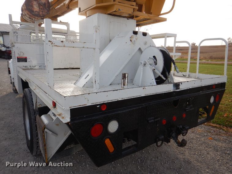 image for item DH8037 1999 International 4700  digger derrick truck