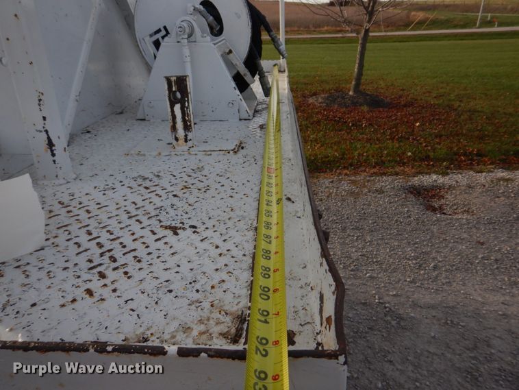 image for item DH8037 1999 International 4700  digger derrick truck