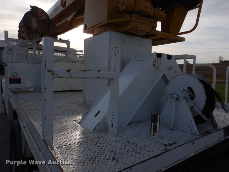 image for item DH8037 1999 International 4700  digger derrick truck