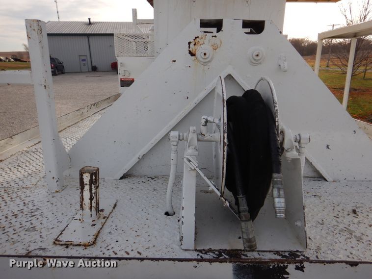 image for item DH8037 1999 International 4700  digger derrick truck