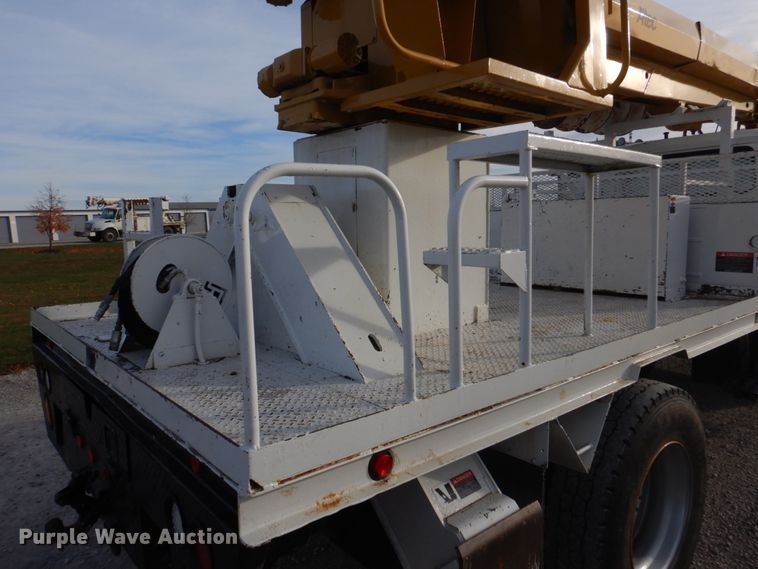 image for item DH8037 1999 International 4700  digger derrick truck