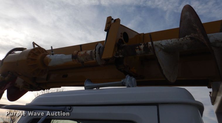 image for item DH8037 1999 International 4700  digger derrick truck