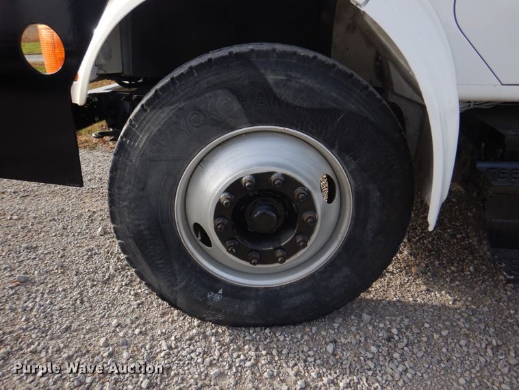 image for item DH8037 1999 International 4700  digger derrick truck