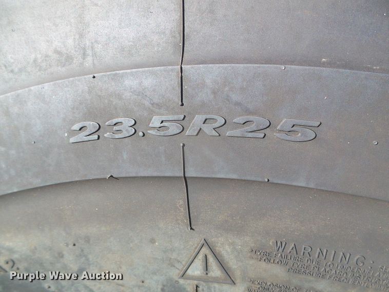 image for item DJ7549 1999 John Deere 644H  wheel loader