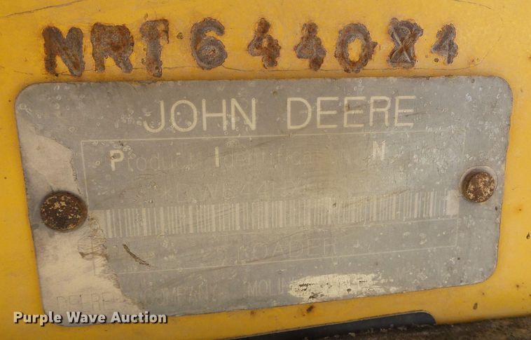 image for item DJ7549 1999 John Deere 644H  wheel loader