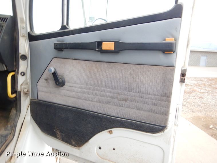 1997 Freightliner FL70 flatbed truck in Yankton, SD Item DK3365 sold