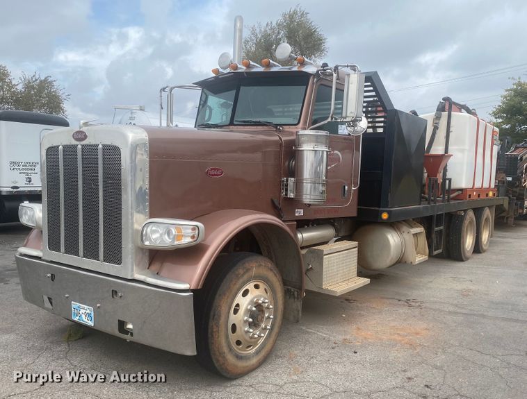 image for item DL6167 2012 Peterbilt 388  flatbed truck with mud mixer