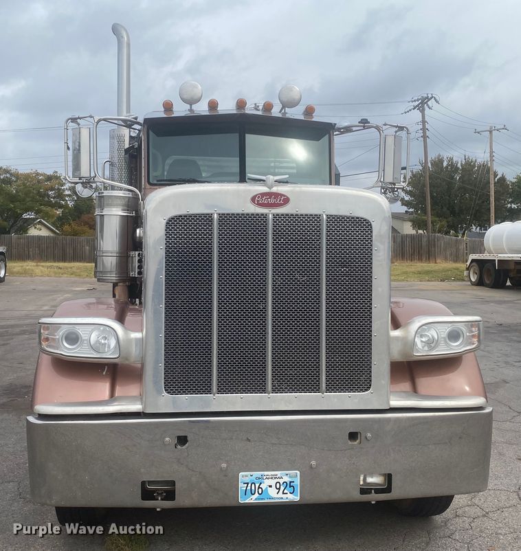 image for item DL6167 2012 Peterbilt 388  flatbed truck with mud mixer