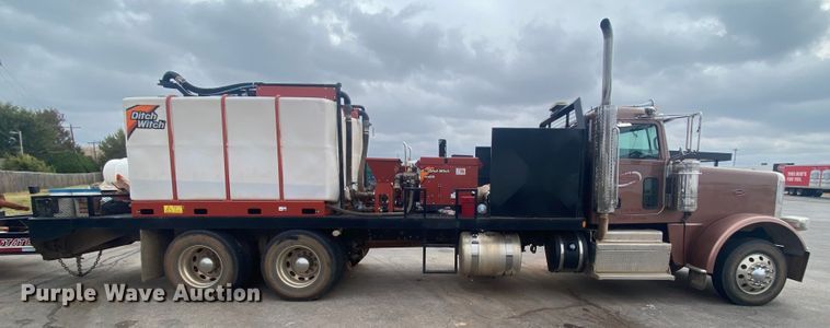 image for item DL6167 2012 Peterbilt 388  flatbed truck with mud mixer