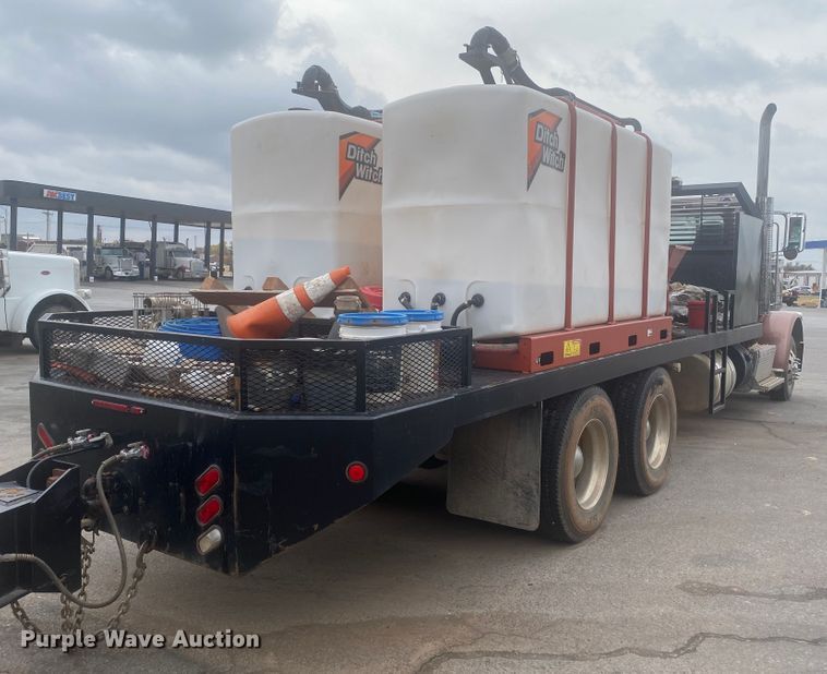 image for item DL6167 2012 Peterbilt 388  flatbed truck with mud mixer