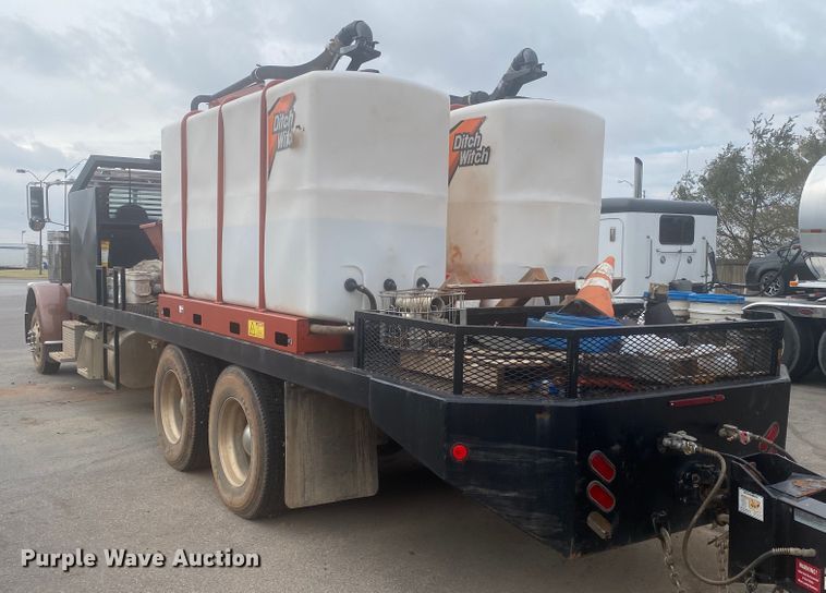 image for item DL6167 2012 Peterbilt 388  flatbed truck with mud mixer