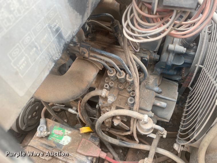 image for item DL6167 2012 Peterbilt 388  flatbed truck with mud mixer