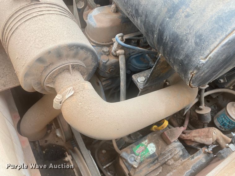 image for item DL6167 2012 Peterbilt 388  flatbed truck with mud mixer