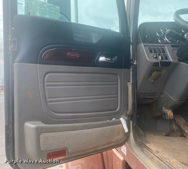 image for item DL6167 2012 Peterbilt 388  flatbed truck with mud mixer