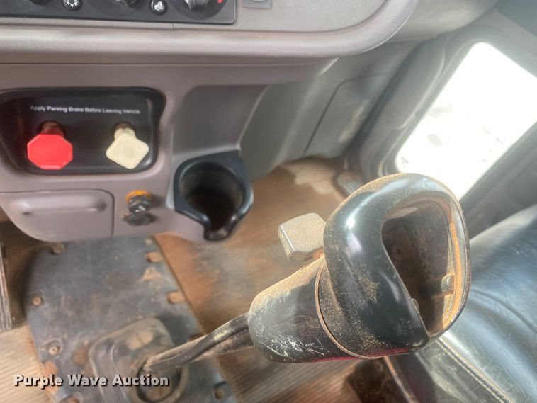 image for item DL6167 2012 Peterbilt 388  flatbed truck with mud mixer