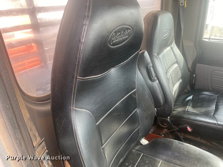 image for item DL6167 2012 Peterbilt 388  flatbed truck with mud mixer