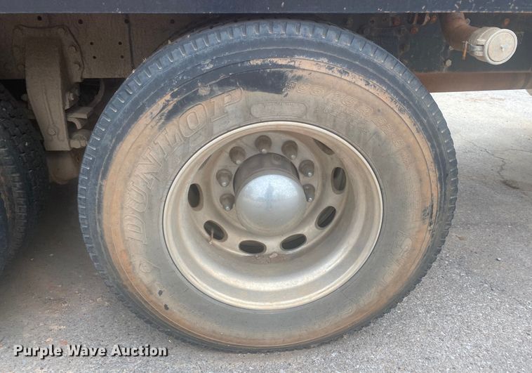 image for item DL6167 2012 Peterbilt 388  flatbed truck with mud mixer