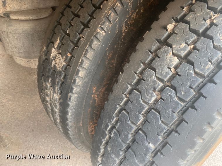 image for item DL6167 2012 Peterbilt 388  flatbed truck with mud mixer